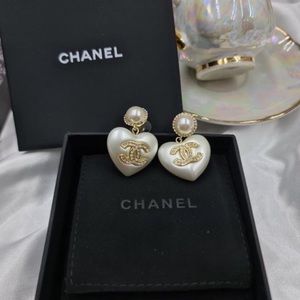 Chanel resin heart drop earrings